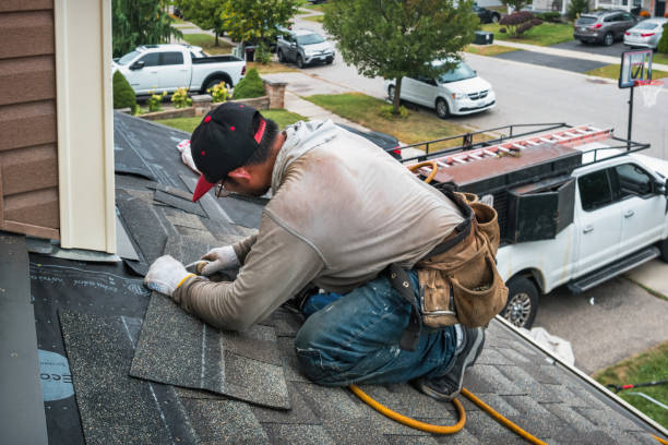 Professional Storm Damage Roof Repair technician working in Big Rock, IL